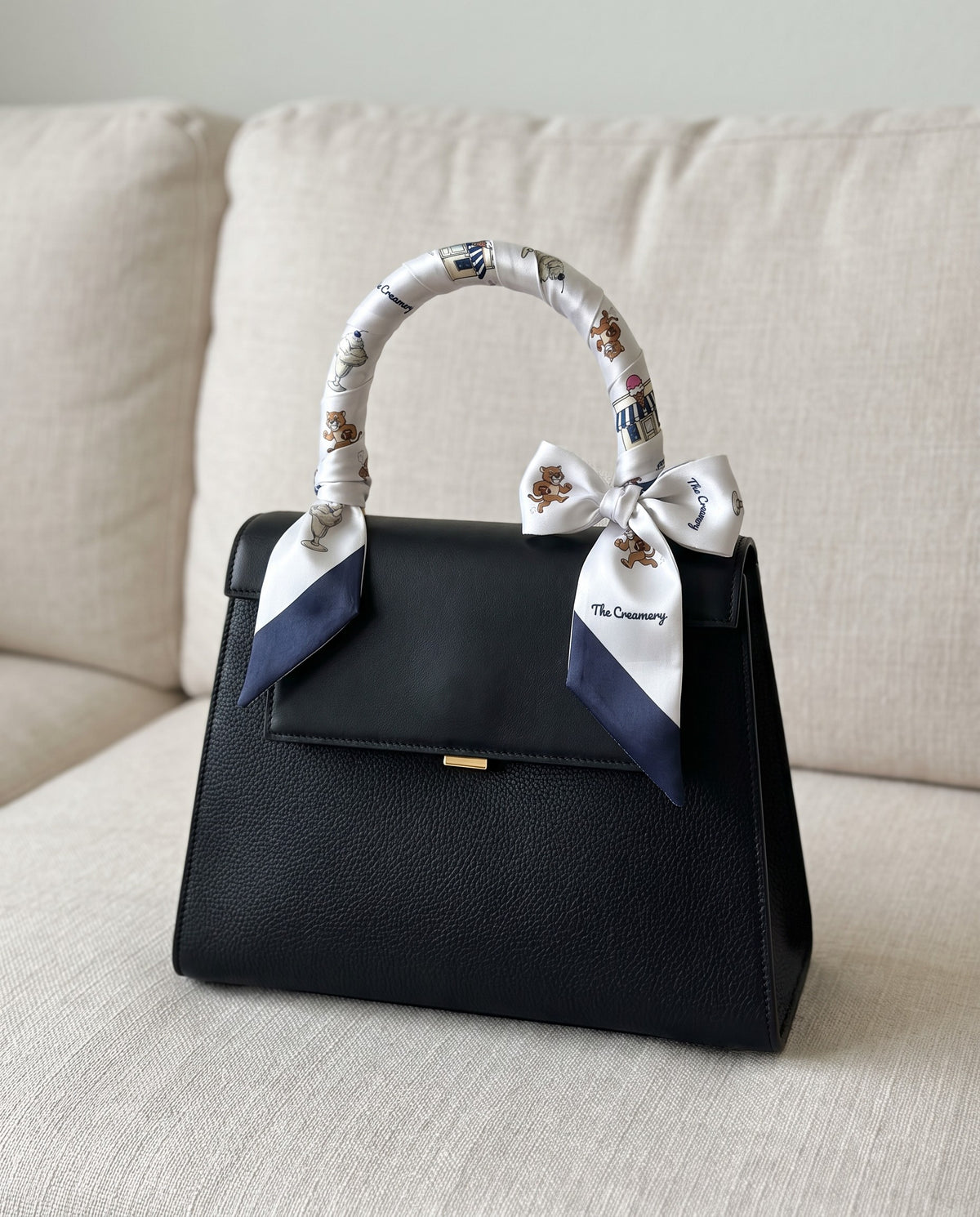 The Creamery Twilly, wrapped on a bag handle