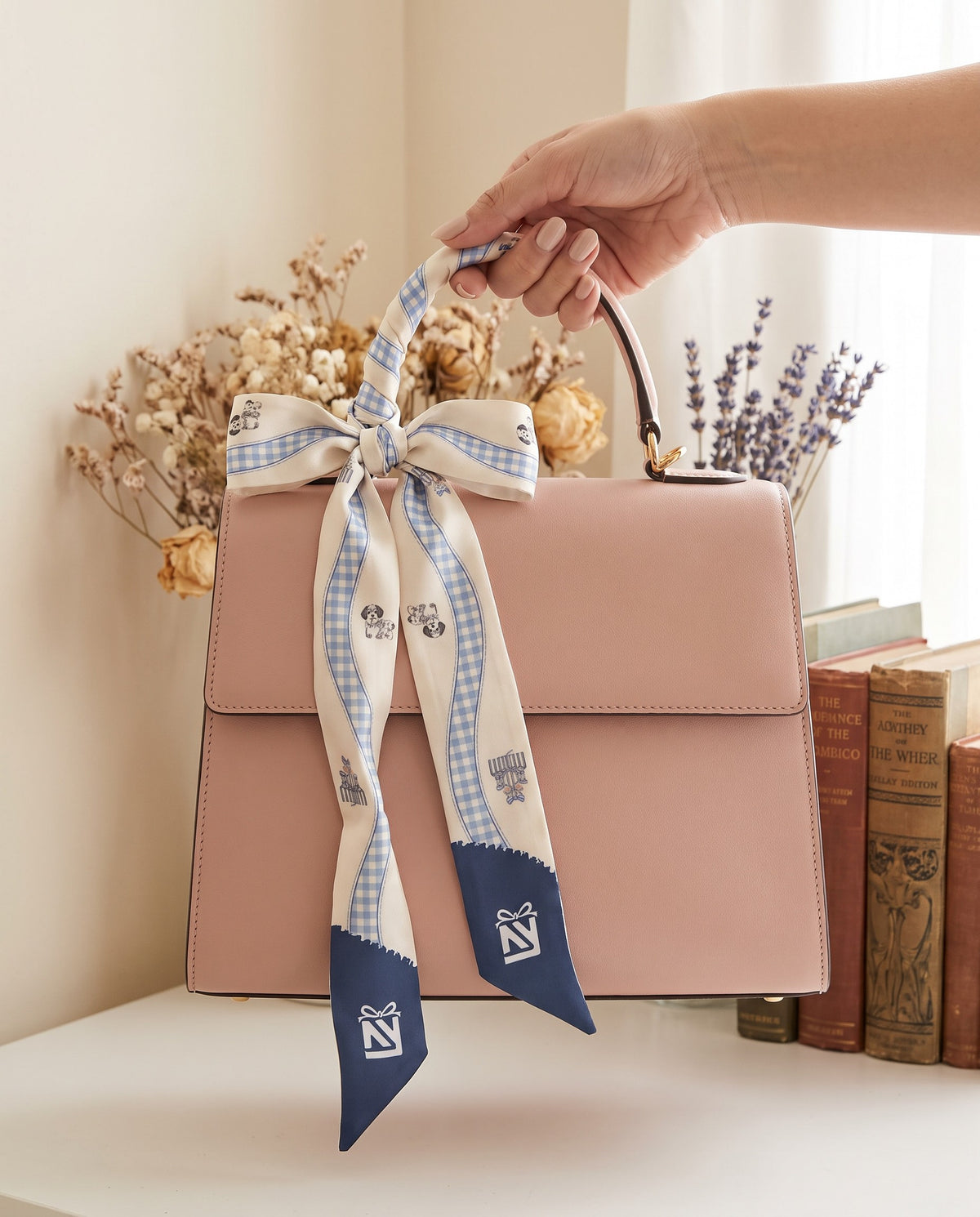 The Puppies Twilly, bow on a top-handle bag